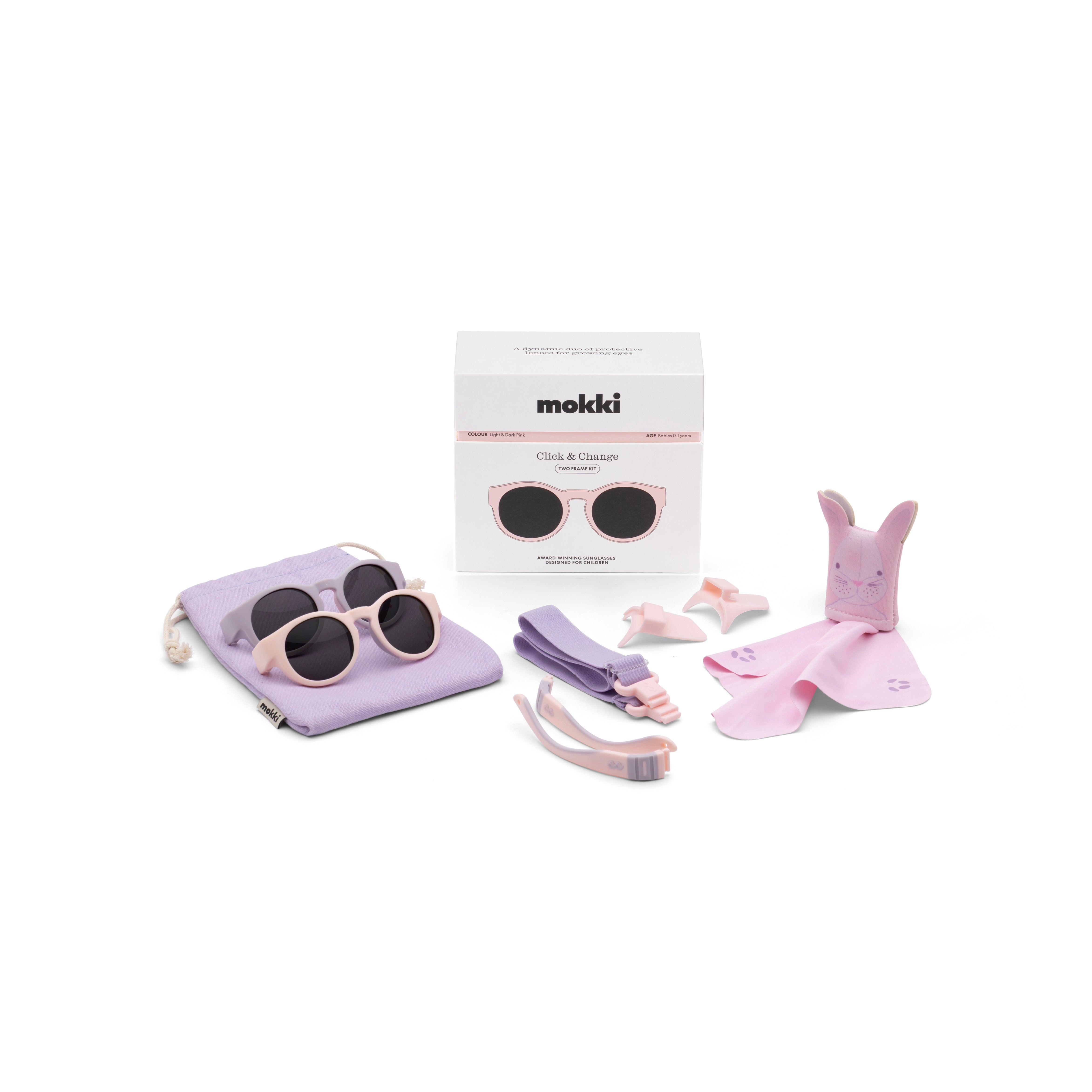 Mokki children's Click & Change sunglasses set with case, cleaning cloth, and box on a white background