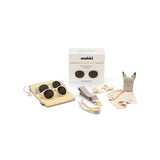 Baby product set with Mokki Click & Change sunglasses, with accessories on a white background
