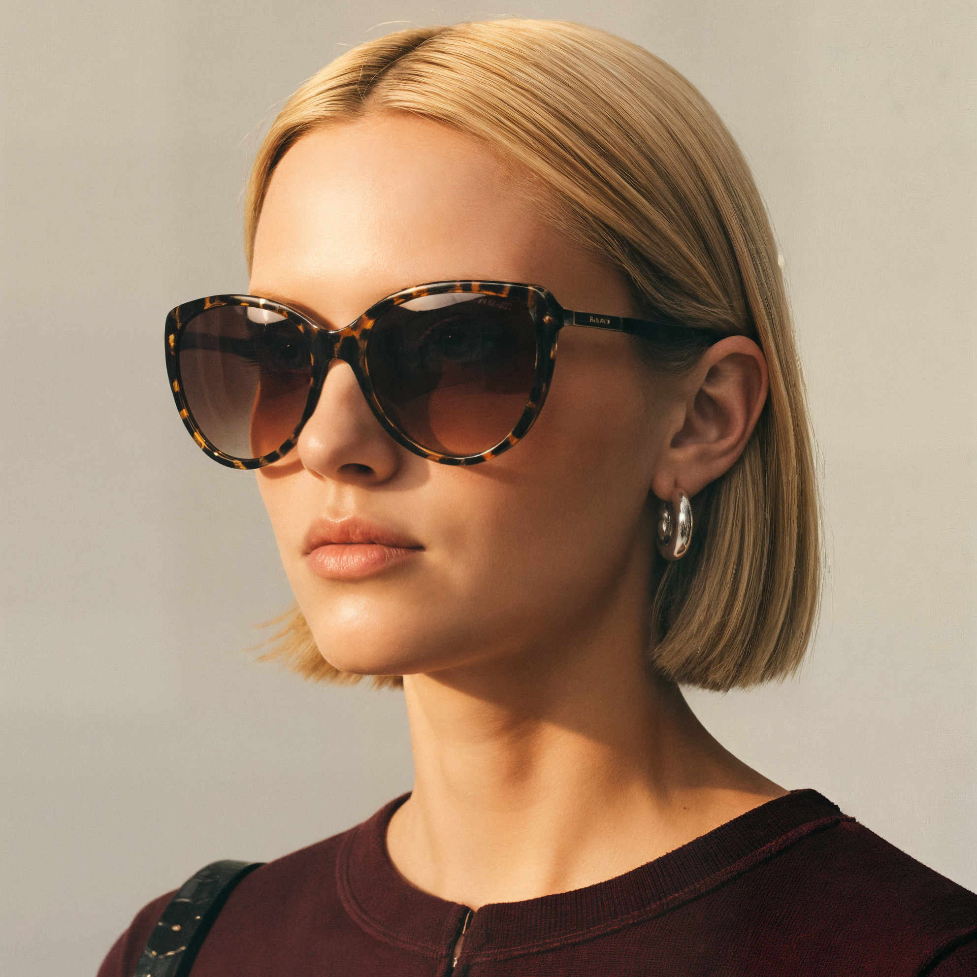 Woman wearing cat-eye sunglasses from Mokki