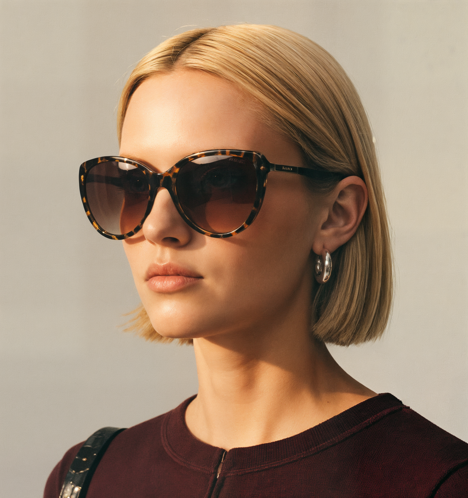 Woman wearing cat-eye sunglasses from Mokki