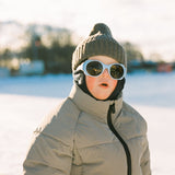 Boy wearing blue Click & Change sunglasses from Mokki