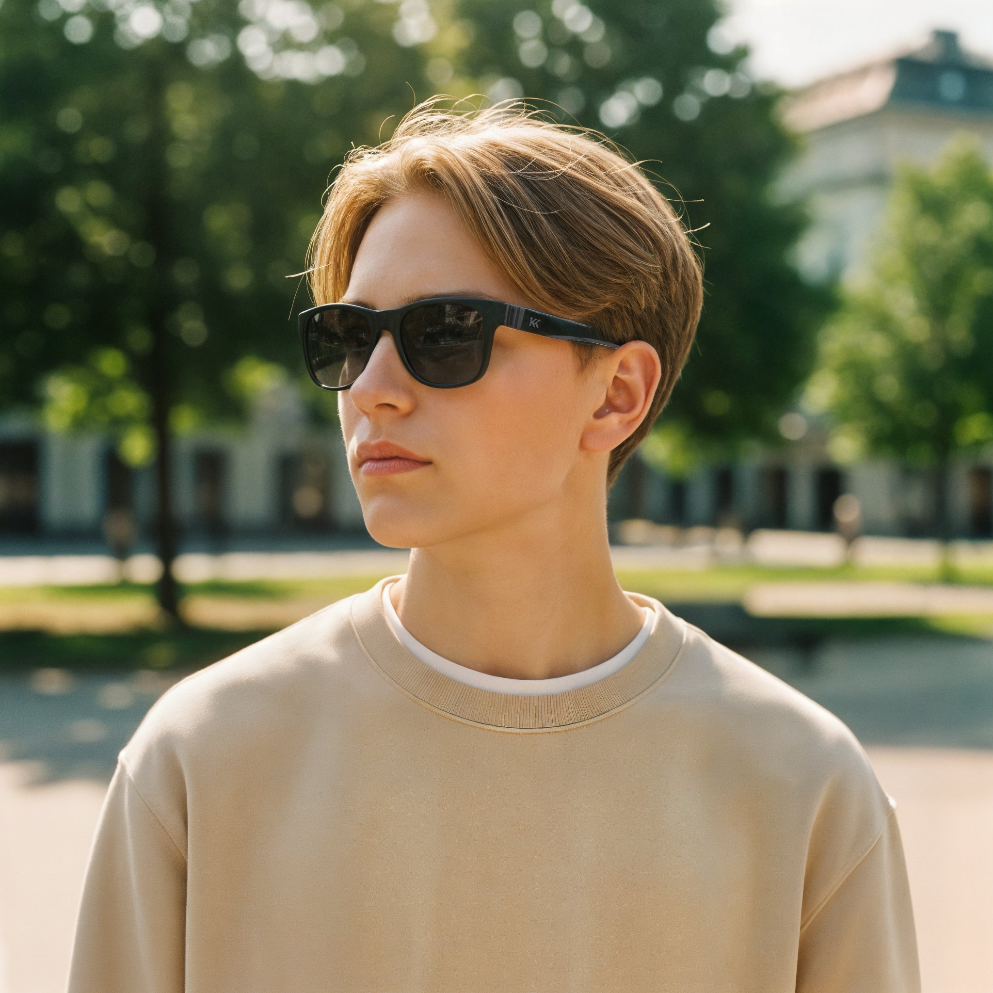 Teenage boy wearing MultiUse Photochromic sunglasses for teenagers
