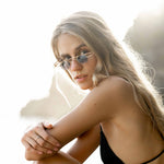 Woman wearing Mokki gold-plated sunglasses