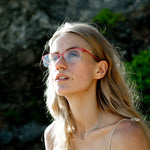 Woman wearing red Mokki reading glasses
