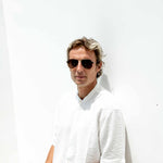 Man wearing Mokki aviator reading glasses with clip-on shades