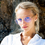 Woman wearing edgy aviator reading glasses from Mokki